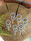 Iron-on patch | daisy flower - 4" x 1.8": Patch attached to backer card