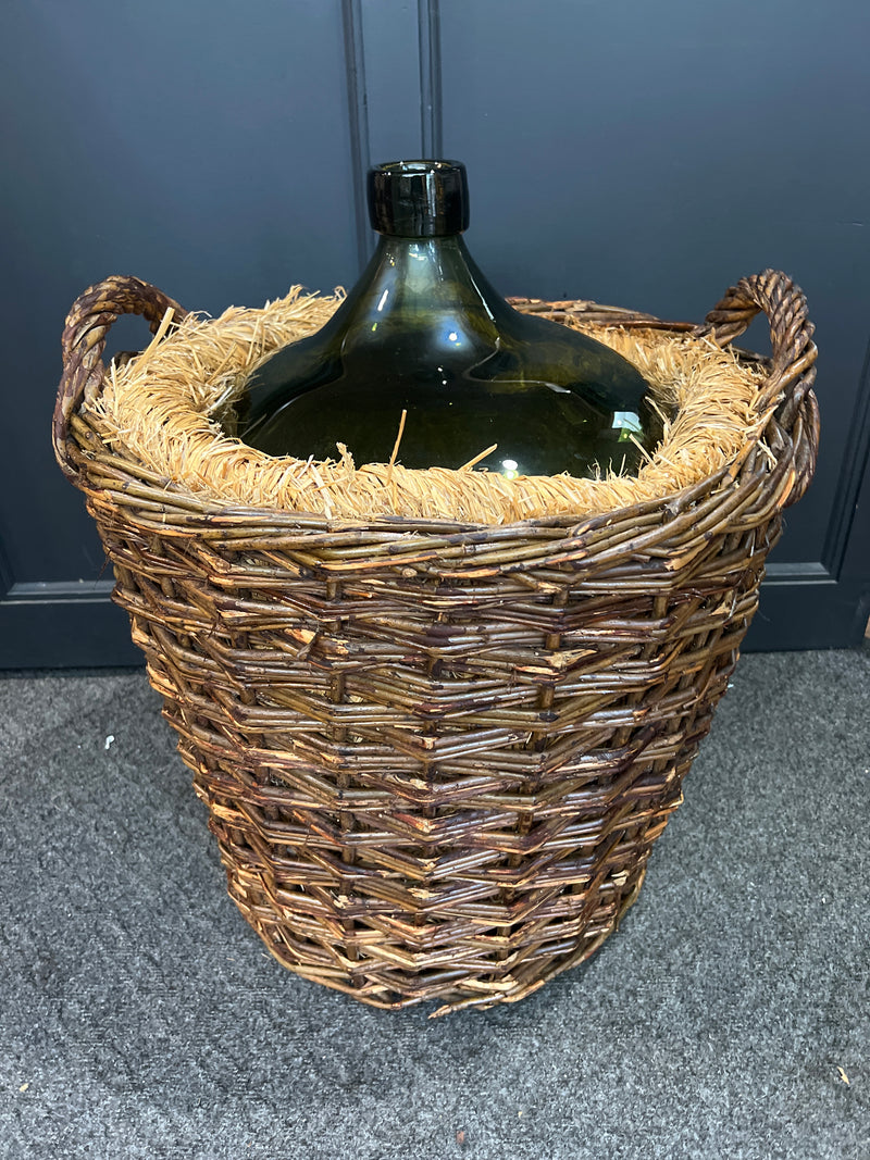 Vintage French Demijohn Green Glass Bottle in Woven Grape Vine Basket