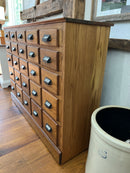 Antique Oak Apothecary Cabinet with 25 Drawers and Milk Glass Labels