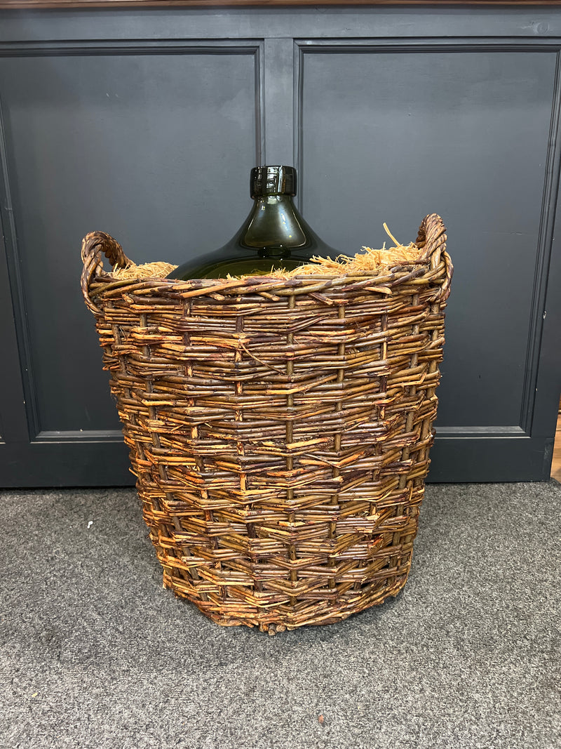 Vintage French Demijohn Green Glass Bottle in Woven Grape Vine Basket