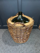 Vintage French Demijohn Green Glass Bottle in Woven Grape Vine Basket