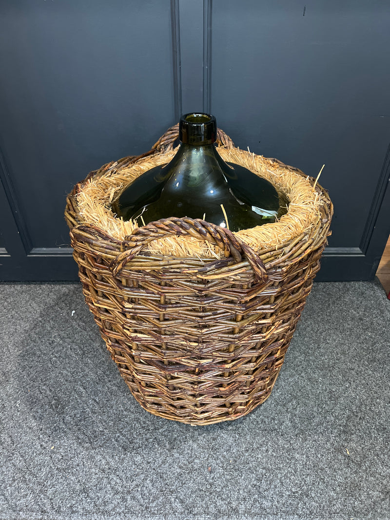 Vintage French Demijohn Green Glass Bottle in Woven Grape Vine Basket