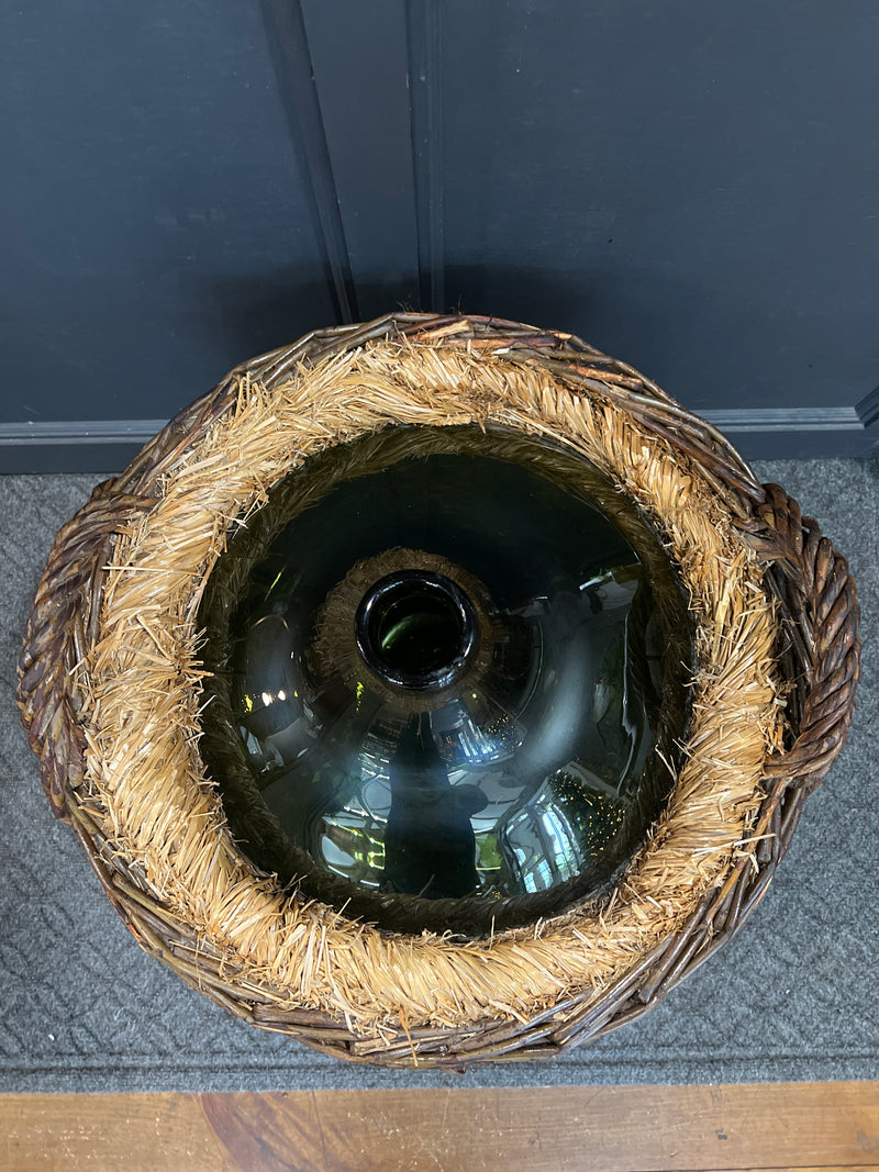 Vintage French Demijohn Green Glass Bottle in Woven Grape Vine Basket