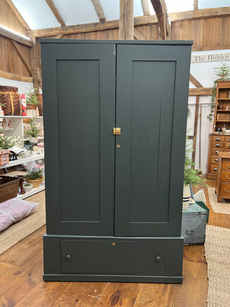 Two Door Primitive Cabinet with Drawer Base