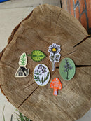 Iron-on patch | daisy flower - 4" x 1.8": Patch attached to backer card