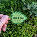 Iron-on patch | take a hike leaf - green 1.75" x 2.75": Patch attached to backer card